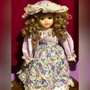 Porcelain doll in floral dress